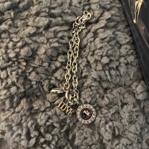 Silver tone FSU Charm Bracelet with Love, football and Seminole head charms